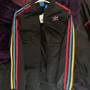 Adidas jacket and matching zip pants. ON HOLD